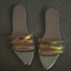 Gold Slip-On Sandals with Metallic Straps and Pointed Toe